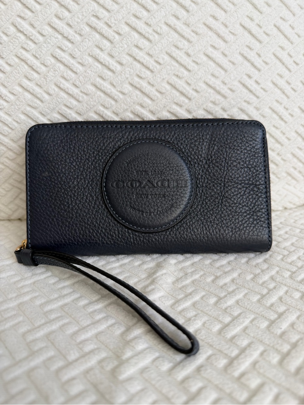 Coach Navy Pebbled Leather Wristlet Wallet with Logo Medallion
